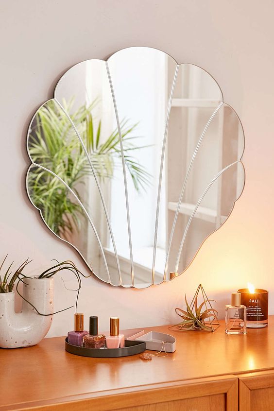 a cool shell mirror will be a perfect decoration and can be used as a mirror, too