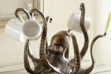 14 a metal octopus coffee cup holder for a mermaid’s kitchen