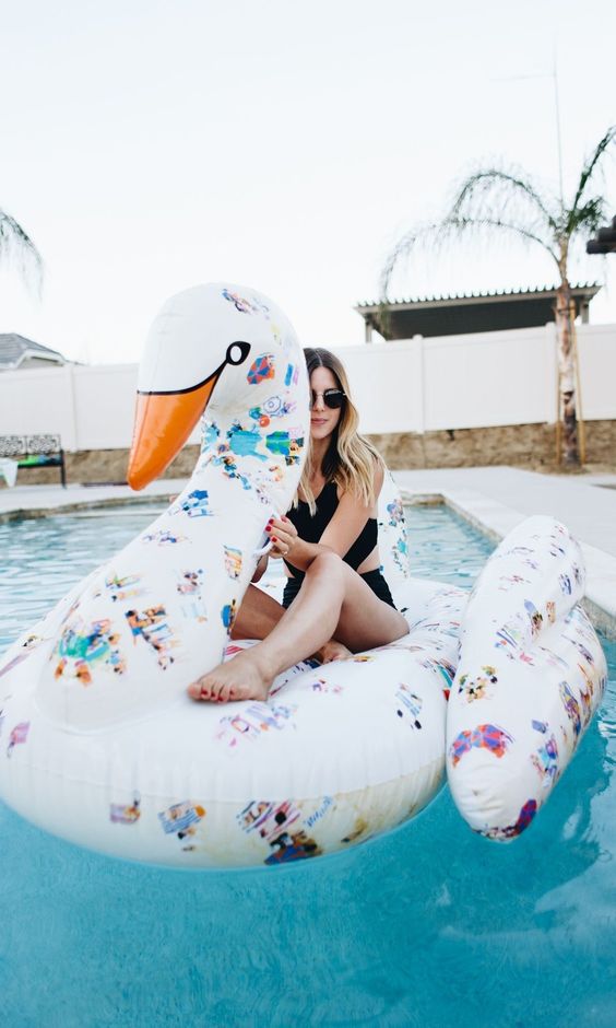 printed swan pool float for girls' parties