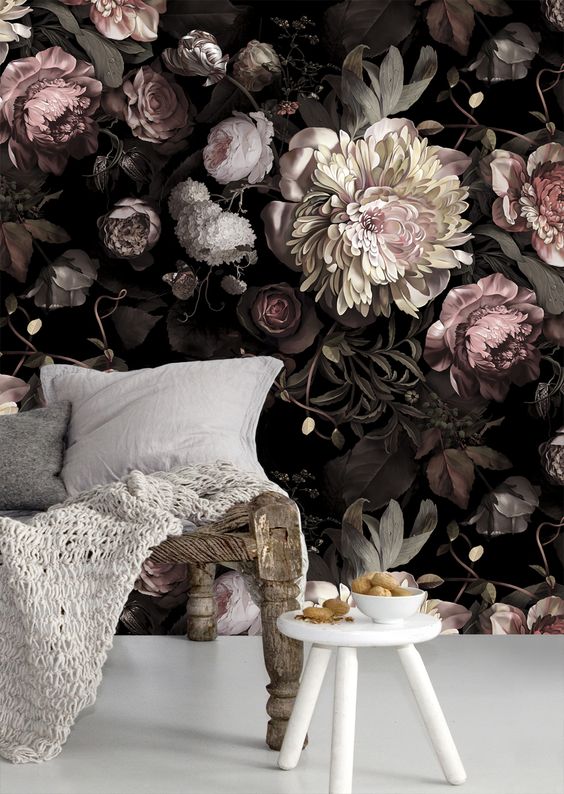 chic dark floral wallpaper with blush flowers makes the living room refined