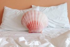 17 coral colored seashell throw pillow