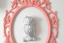 18 cool pink ornate frame around a sculptural owl
