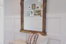 19 curved mirror in a large wooden frame with an antique feel