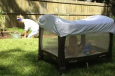 03 a portable crib covered on top to keep your child safe