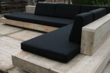 06 timber seating wih black cushions is an elegant combo