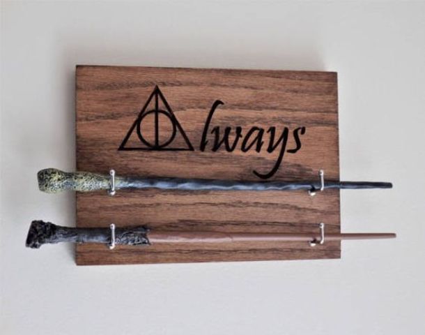 dual wand holder with a sign will be a cute wall decoration