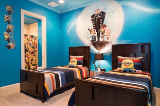 Despicable Me themed shared kids' room with wall decals and pillows