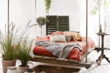 09 pallet and rope hanging bed in a boho Mediterranean bedroom