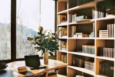 09 warm mid-century modern home office with forest views to relax