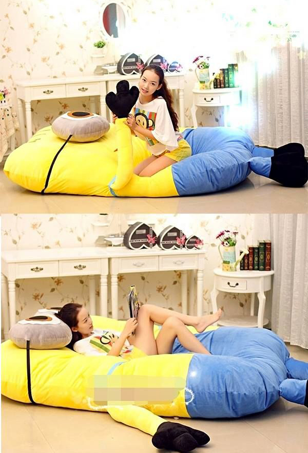 oversized minion floor cushion that can be used as a bed