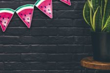 14 a paper watermelon garland will cheer up any space and you can make it fast