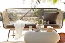 15 an ethereal wicker seating on metal legs looks very stylish and boho chic
