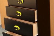 16 a simple IKEA dresser can be turned into a Batman’s with plack paint and Batman knobs
