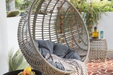 18 resin wicker hanging chair in a balcony is a perfect choice to chill