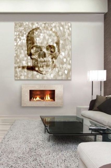 a glam holographic skull wall art with hearts for a modern space