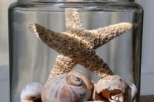 03 a jar with shells, beads and a star fish for a natural beach look