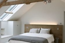 03 a minimalist bedroom with a small skylight to make it more light-filled