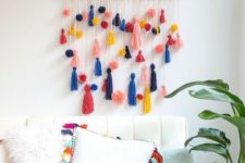 06 a colorful tassel hanging and a matching pillow will easily make your bedroom summery