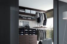 09 hide your walk-in closet behind smoked glass sliding doors to keep the space modern and masculine