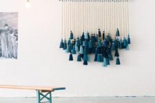 10 an ombre teal, turquoise and aqua tassel wall hanging will remind you of the seaside