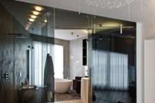 10 separate the en-suite bathroom from your bedroom with smoked glass doors to keep both spaces light-filled and connected
