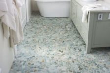 10 use green pebble tiles on the bathroom floor, so you’ll get no fuss and a cool floor