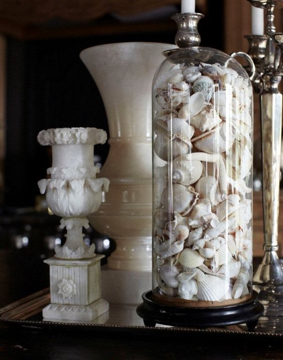 a tall cloche with small shells inside is a very easy decoration
