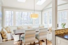 12 a glazed dining zone is offered views and daylight with a couple of skylights above