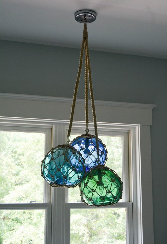 glass fishing float cluster pendant light for a beach home
