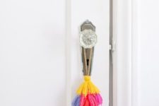 13 colorful tassel door hanging will take you a couple of minutes and will add cheer