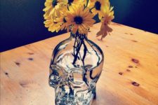 13 glass skull vase with fresh blooms is an easy way to incorporate a skull into your decor