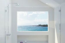 14 all-white shower with skylights and a window with sea views – who needs more