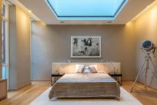 15 a modern bedroom with a square skylight for those who love the sky