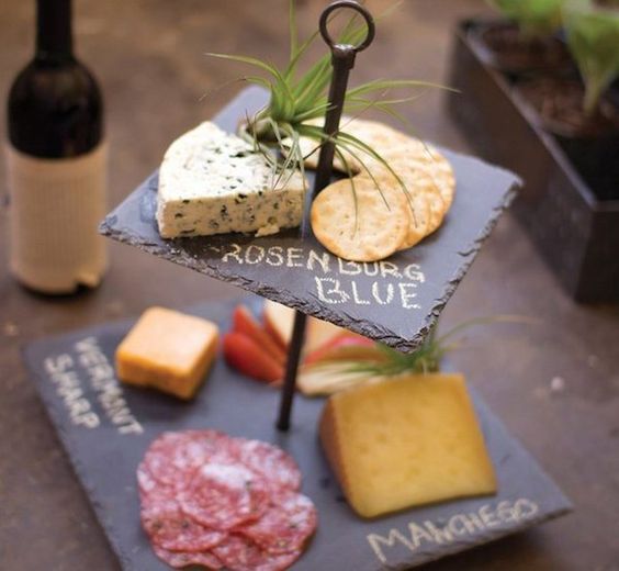 finely cut slate boards for a cheese serving stand is a cool and unusual idea