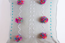 DIY embroidered and pompom pillows
