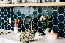 03 teal hexagon tiles with white grout add color to the white kitchen
