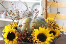 07 a bold arrangement with sunflowers, a pumpkin and berries