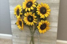 09 a rustic pallet sign with wire and faux sunflowers is ideal for wall decor