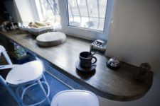 09 a windowsill used as a tabletop in the kitchen is a gorgeous idea for a small space