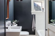 dark bathroom design with white touches