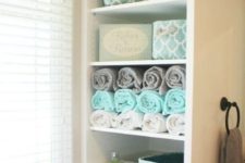 10 open shelving unit with towels and various bathroom stuff if there’s enough space