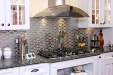 11 shiny metal backsplash for a modern kitchen