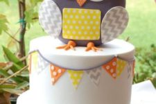 12 a grey and yellow large owl baby shower cake with a banner