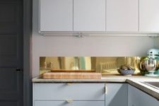 12 brass sheet kitchen backsplash and matching drawer handles for a chic and glam look