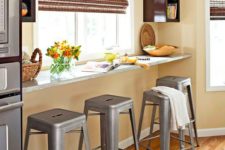13 a windowsill breakfast bar and metal stools look very inviting and cozy