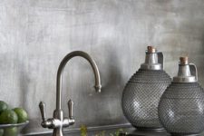 13 burshed metal kitchen backsplash looks textural and adds interest to the kitchen