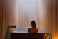 14 Japanese styled bathroom with skylights over the bathtub for a spa feel