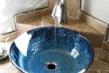 14 an ombre blue potter sink with a vintage faucet looks very coastal-inspired