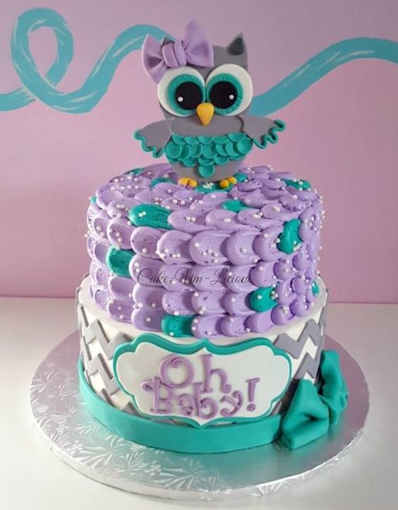 cute and bold owl cake in teal and lilac for a gender-neutral baby shower