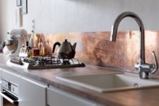 15 copper sheet backsplash looks unique and very eye-catchy plus it’s not expensive